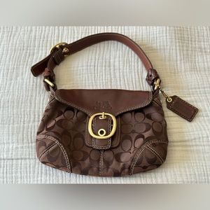 Coach canvas and leather soho flap handbag with buckle